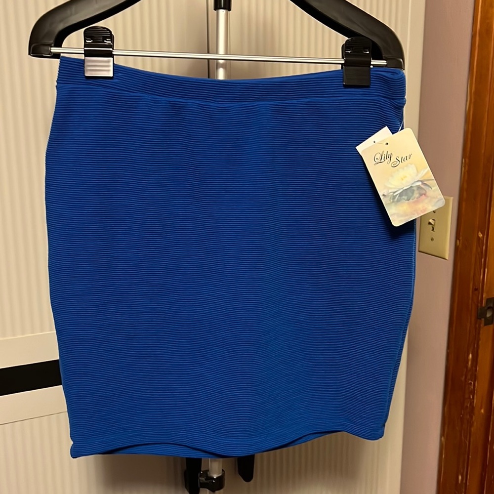 Ladies brand new blue size XL pull-on skirt.